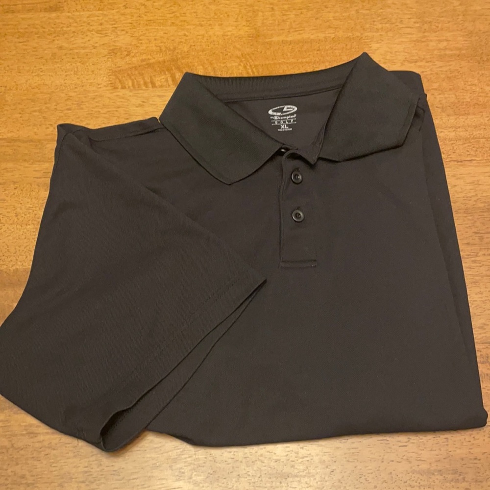 Champion XL. Black golf shirt.